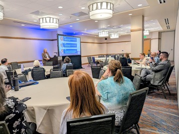 Jill Nichols presenting at the National Opioid Settlement Conference