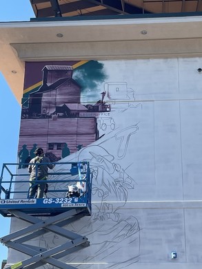 Museum mural being painted