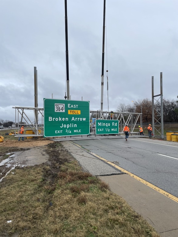 Crews work to remove damaged overhead sign structure