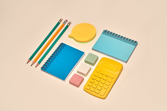 picture of pencils, speech bubble, calendar, planner and calculator