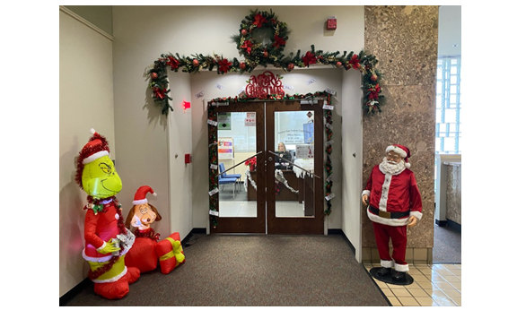Front doors of office decorated for Christmas.