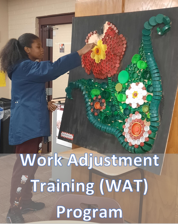 Work Adjustment Training student working on an art project in her classroom