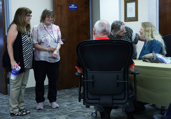 Group of people talking.