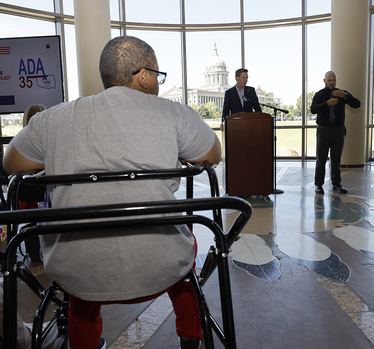 Oklahoma Lt. Gov. Matt Pinnell welcomes supporters to an ADA celebration July 25 at the Oklahoma History Center.