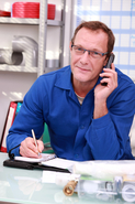 Craftsman talks on the phone