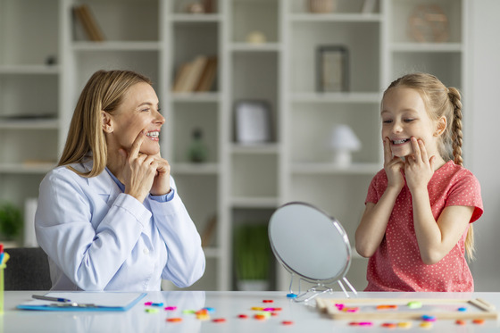 Photo of a speech therapist with a child