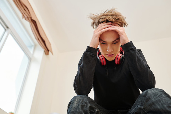 Photo of a stressed teenager