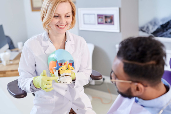 Photo of a dentist with a patient