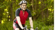 Photo of a senior riding a bike