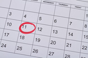 Photo of a calendar with a date circled
