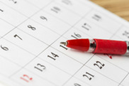 Photo of a pen on a calendar
