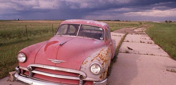 Route 66 car beside highway