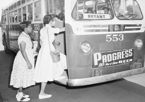 Black Women boarding a bus on 4th street