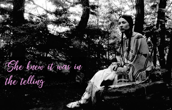 Te Ata seated in her native clothing in a wooded area, the caption reads "She knew it was in the telling"