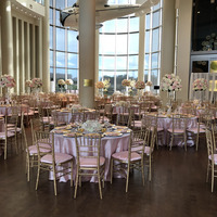 The Devon Hall of the Oklahoma History Center with tables and flower arrangements for a wedding