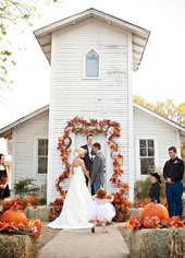Atoka Museum decorated chapel with a couple getting married outside