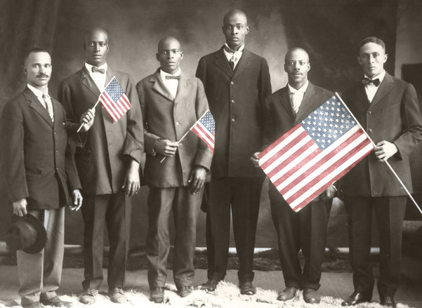 African American World War One Veterans holding American flags