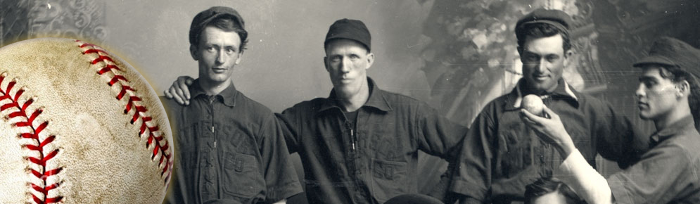 Detail of a baseball with an historic photo of 19th century ballplayers holding bats and balls