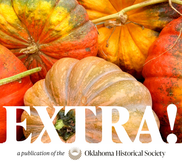 A group of colorful pumpkins with the word of the publication "EXTRA!" in white lettering below