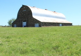 Stone barn situated on a hill