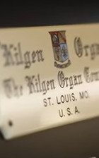 A detail of the Kilgen organ metal plate label, with the manufacturer's town St. Louis