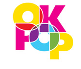 The OKPOP Museum logo stacked flourescent letters jumbled together with color mixtures at the intersection of the letters