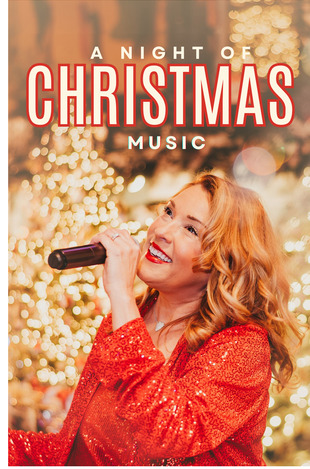 Darla Zuhdi sings into a microphone with holiday lights surrounding her on stage and the words "A Night of Christmas Music."