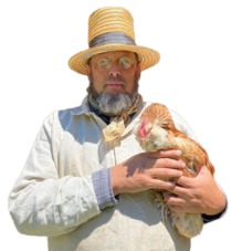 OHS Regional Director Dave Fowler with a straw hat, John Lennons, holding a chicken under his arm.