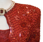 The shoulders and bejeweled neckline of the Rhonda Walters inaugural ballgown. The dress has beautifully patterned beading and sequins.