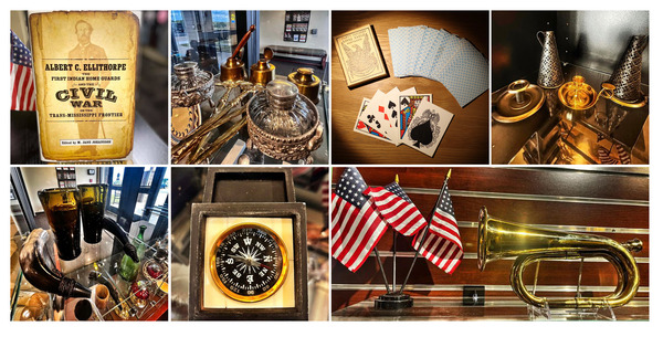 Honey Springs Battlefield store items including hand-blown glass, inkwells, playing cards, replica bugle, a compass, and books.