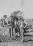 A group of people gathered on the Kansas Oklahoma border the day before the 1893 Cherokee Outlet Land Run