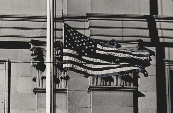 An American flag lowered to half staff at the Oklahoma City Post Office