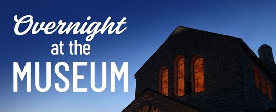 A photo of the Will Rogers Museum at Night and the words "Overnight at the Museum" against the night sky