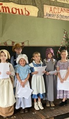 Schoolchildren in historical costumes