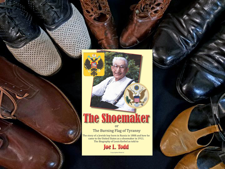 Five pairs of shoes including men's and women's pairs surround a copy of the book "The Shoemaker"