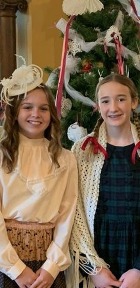 Guthrie's Carnegie Library Carolers in Victorian dress