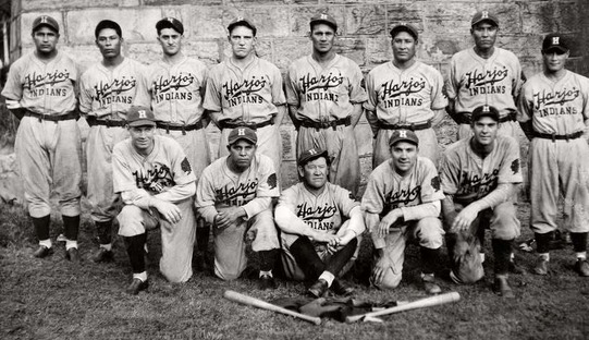 "Harjo's Indians" baseball team with Jim Thorpe seated center as the coach, c. 1933