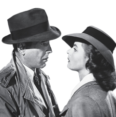 Humphrey Bogart and Ingrid Bergman stand together in hats, featured in a black and white still from the movie "Casablanca."