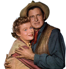 Will Rogers Jr. holds a female star, they are dressed in Western gear for the film "The Boy from Oklahoma"