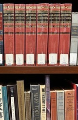 The Lincoln collection of books at the Oklahoma Historical Society. Spines of books are facing out on shelves