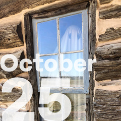 A person dressed in a sheet as a ghost at the window, with the date October 25 seen in the corner