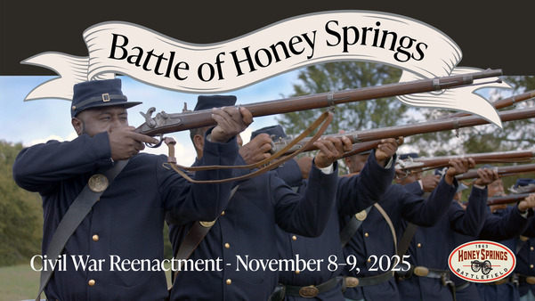 A line of living history reenactors firing muskets at the Battle of Honey Springs reenactments with the logo of HSB and the dates of the event