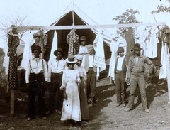 A group of Black homesteaders at an encampment at Fort Gibson.