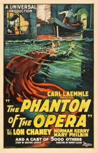 The vintage Phantom of the Opera movie poster with an illustration of the Phantom swimming in the underwater lair of the Paris opera house.