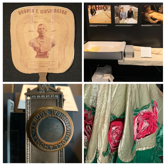 A fan with a picture of Booker T. Washington, Collection boxes, a 1930s brass doorknob and backplate, and an evening gown with large rose appliques