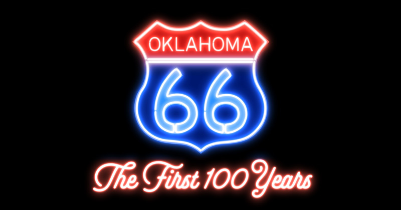 A bright neon highway shield denoting Highway 66, and the words below that read "The First 100 Years"