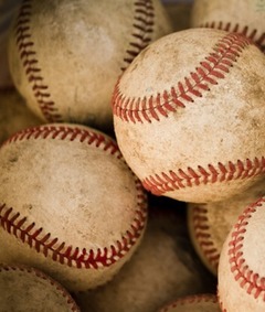 A pile of dirty baseballs