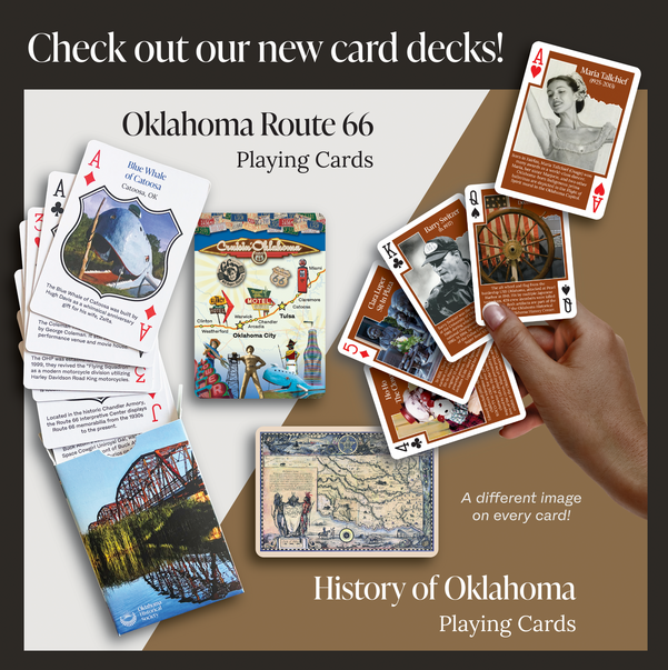 Card decks with a Route 66 and a History of Oklahoma theme. Cards, held by a fanned out hand depict Barry Switzer, Maria Tallchief