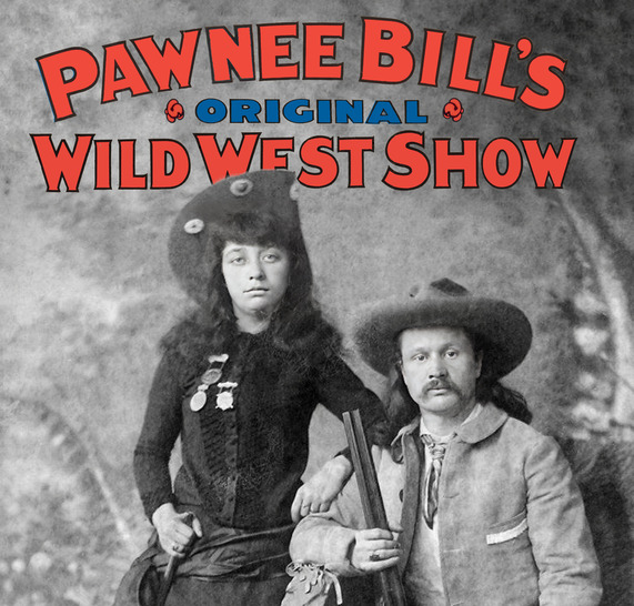 Pawnee Bill and May Lillie pose in Western wear with cowboy hats and rifles