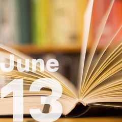 An open book and large lettering superimposed on the image that reads June 13.